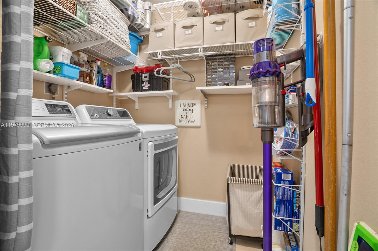 10978 Southwest 75th Terrace Miami, FL 33173 - Photo 17 of 34 a utility room with dryer and washer