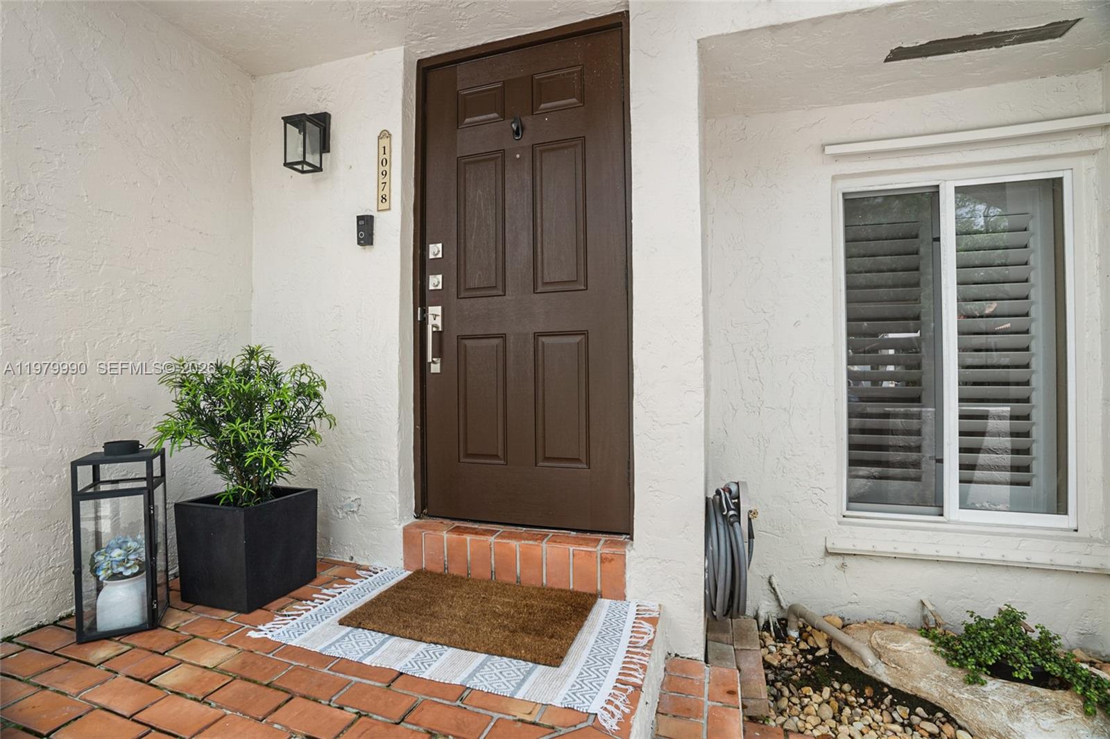10978 Southwest 75th Terrace Miami, FL 33173 - Photo 20 of 34 a view of front door of house