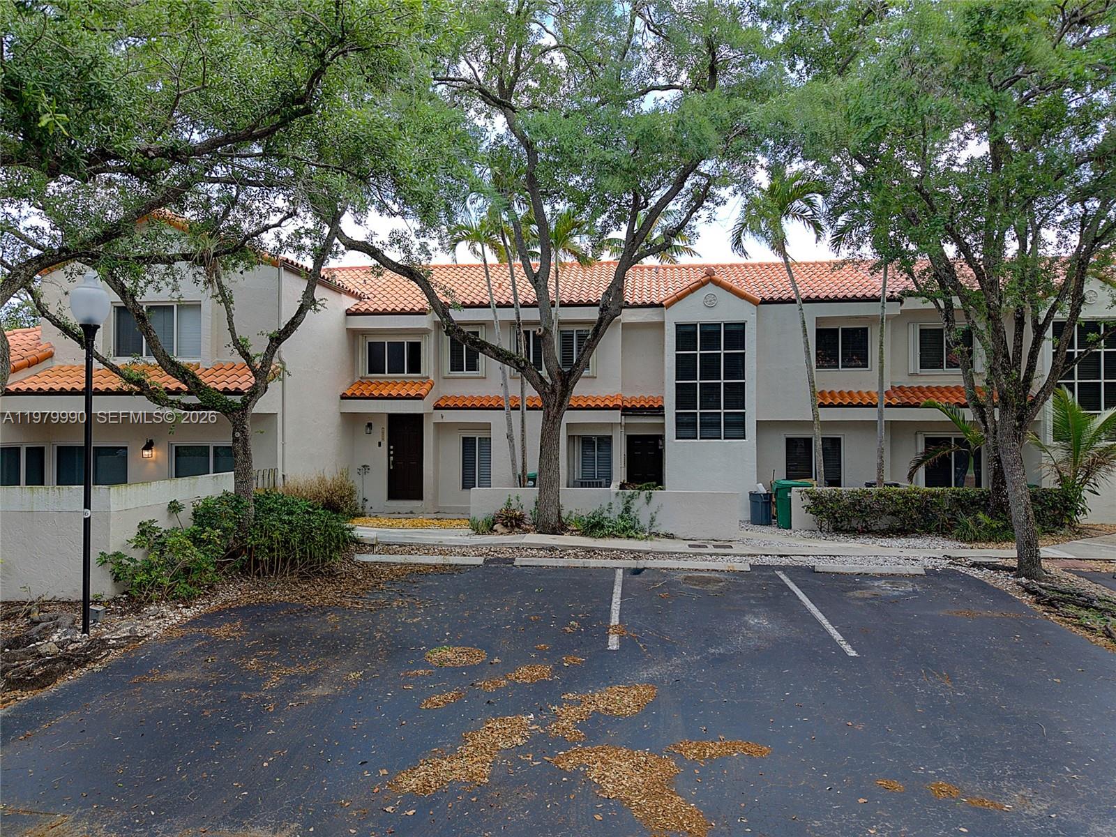 10978 Southwest 75th Terrace Miami, FL 33173 - Photo 23 of 34 a front view of a house with a street