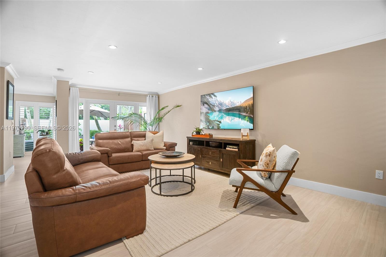 10978 Southwest 75th Terrace Miami, FL 33173 - Photo 7 of 34 a living room with furniture and a large window