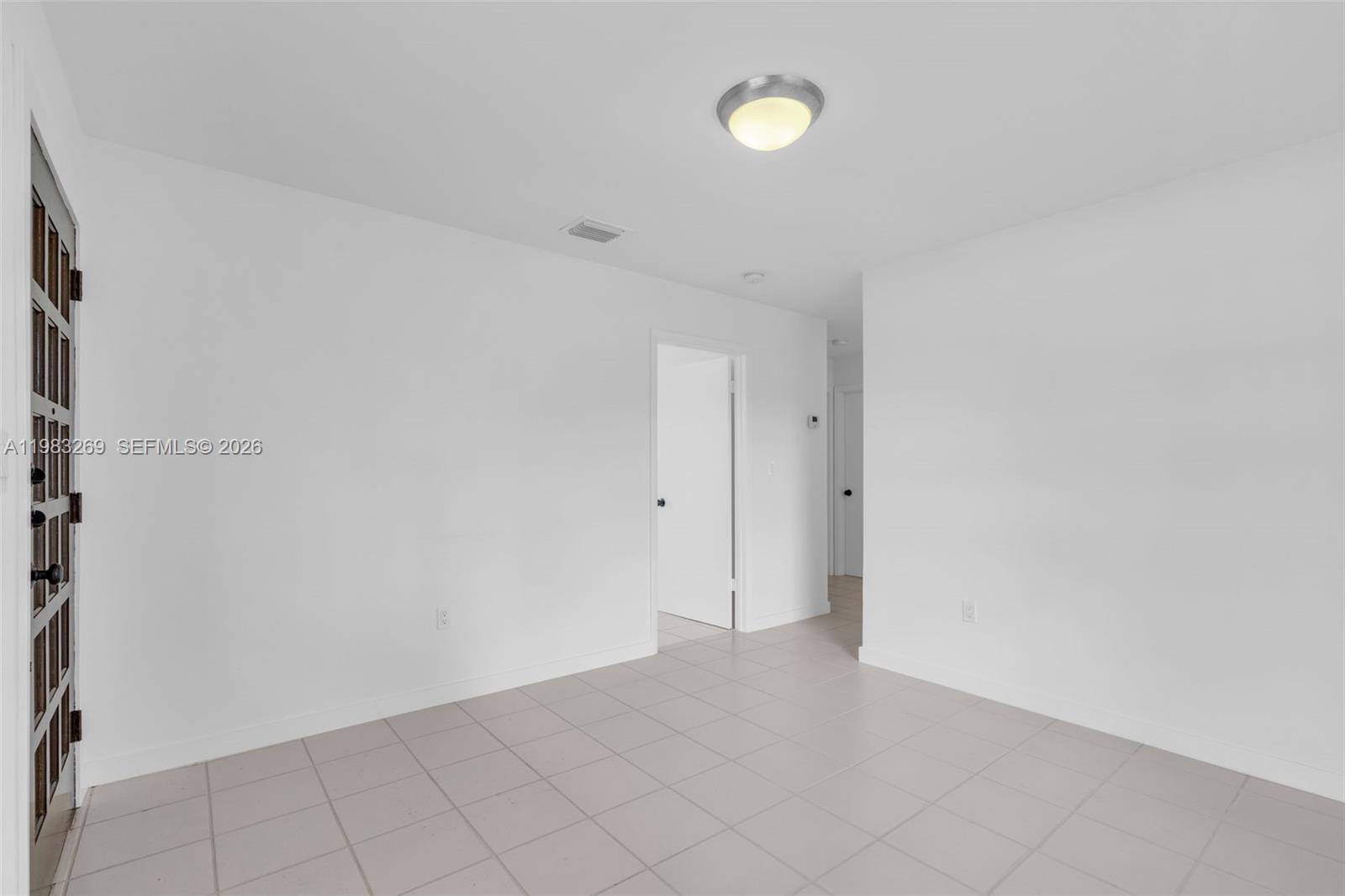 3572 Southwest 25th Street Miami, FL 33133 - Photo 5 of 18 a view of an empty room