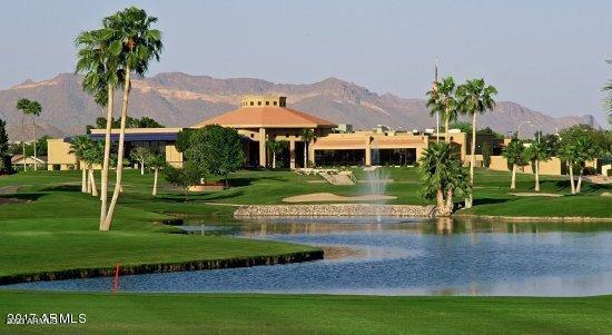 5415 East McKellips Road, Unit 94 Mesa, AZ 85215 - Photo 24 of 64 a front view of house with yard and green space