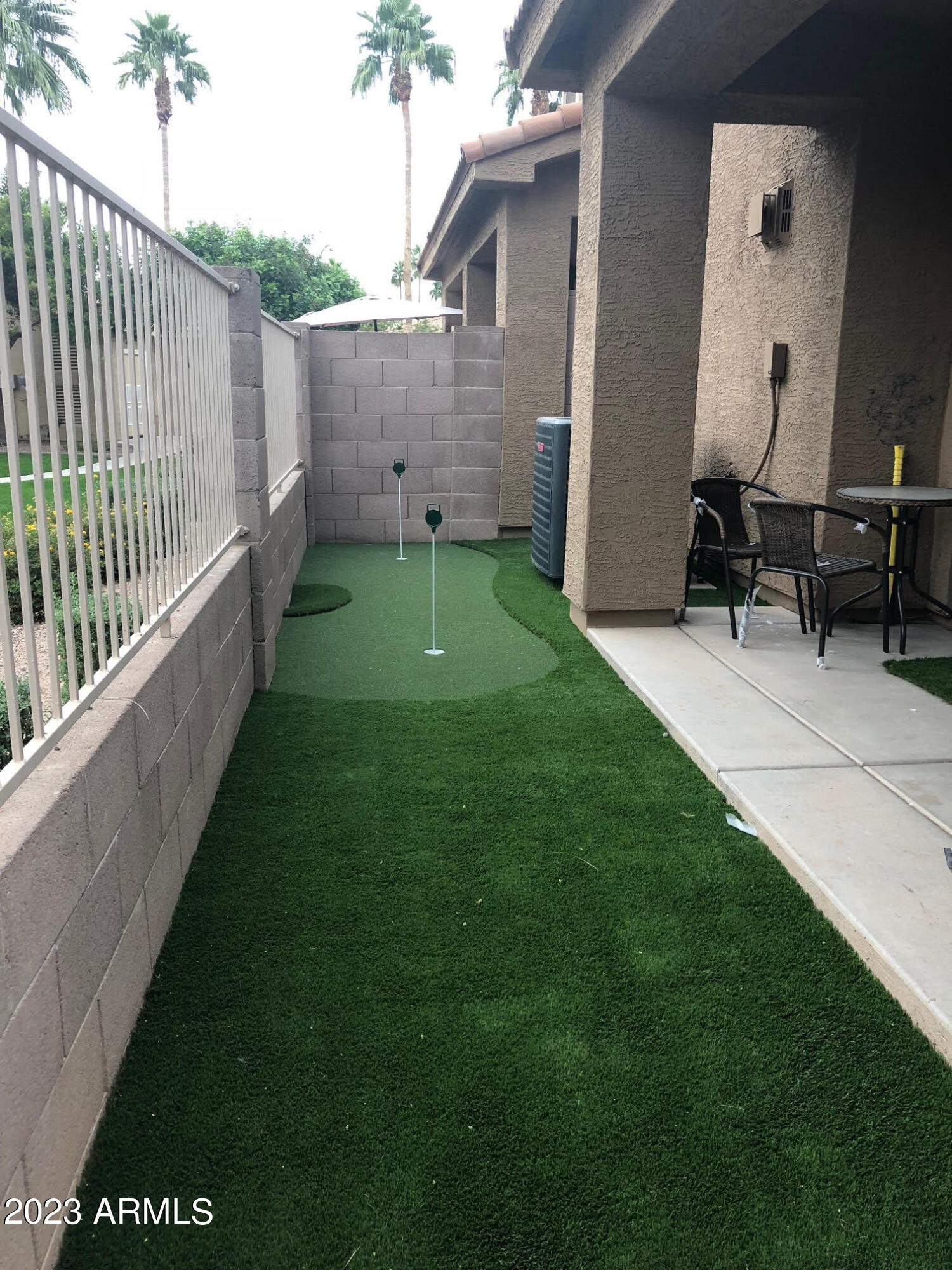 5415 East McKellips Road, Unit 94 Mesa, AZ 85215 - Photo 26 of 64 a view of backyard with cabin
