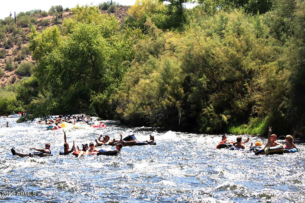 5415 East McKellips Road, Unit 94 Mesa, AZ 85215 - Photo 57 of 64 a view of a road with a snow on the road