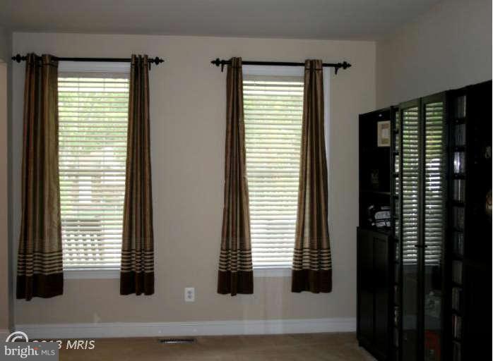 4027 Brummel Road Pasadena, MD 21122 - Photo 4 of 25 a view of wooden floor