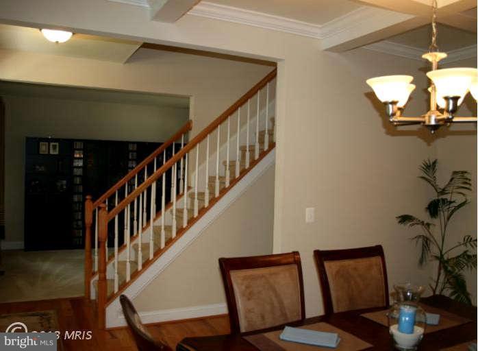 4027 Brummel Road Pasadena, MD 21122 - Photo 8 of 25 a view of entryway and hall with wooden floor
