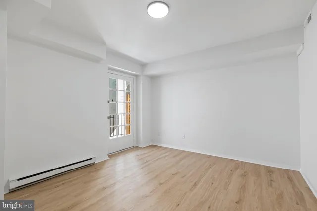 a view of a balcony with a tree