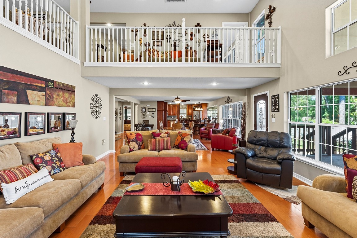 200 Trott Lane Point Blank, TX 77364 - Photo 11 of 50 a living room with furniture a ceiling fan and a rug
