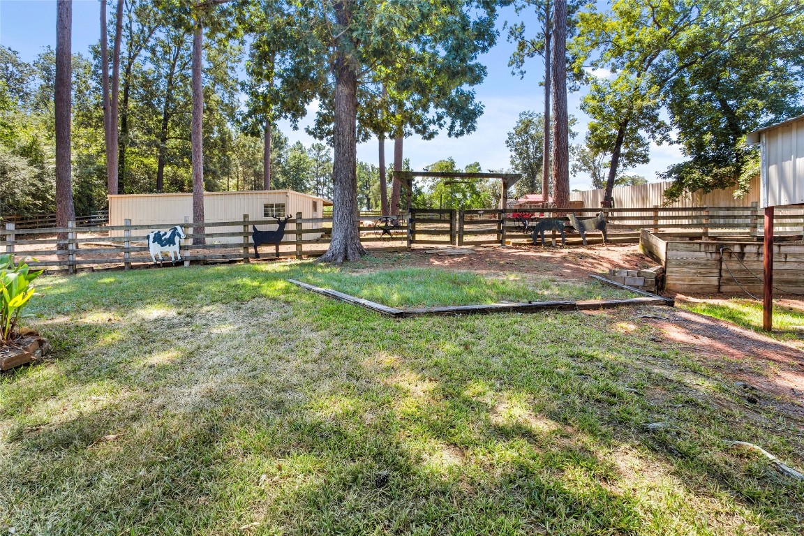 200 Trott Lane Point Blank, TX 77364 - Photo 47 of 50 a view of yard with swimming pool and green space