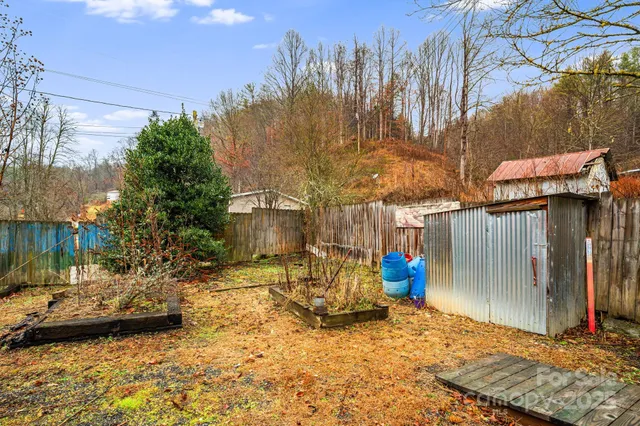 a view of parking area of a house