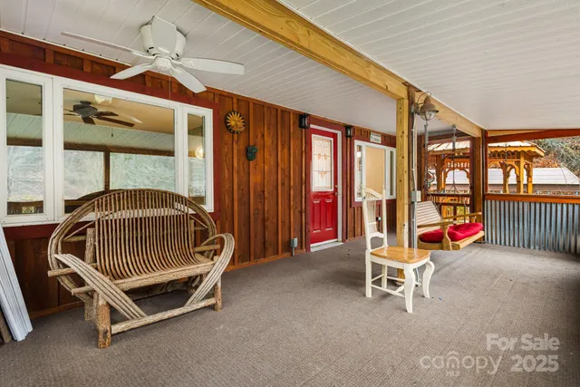 a bedroom with a bunk bed and a window