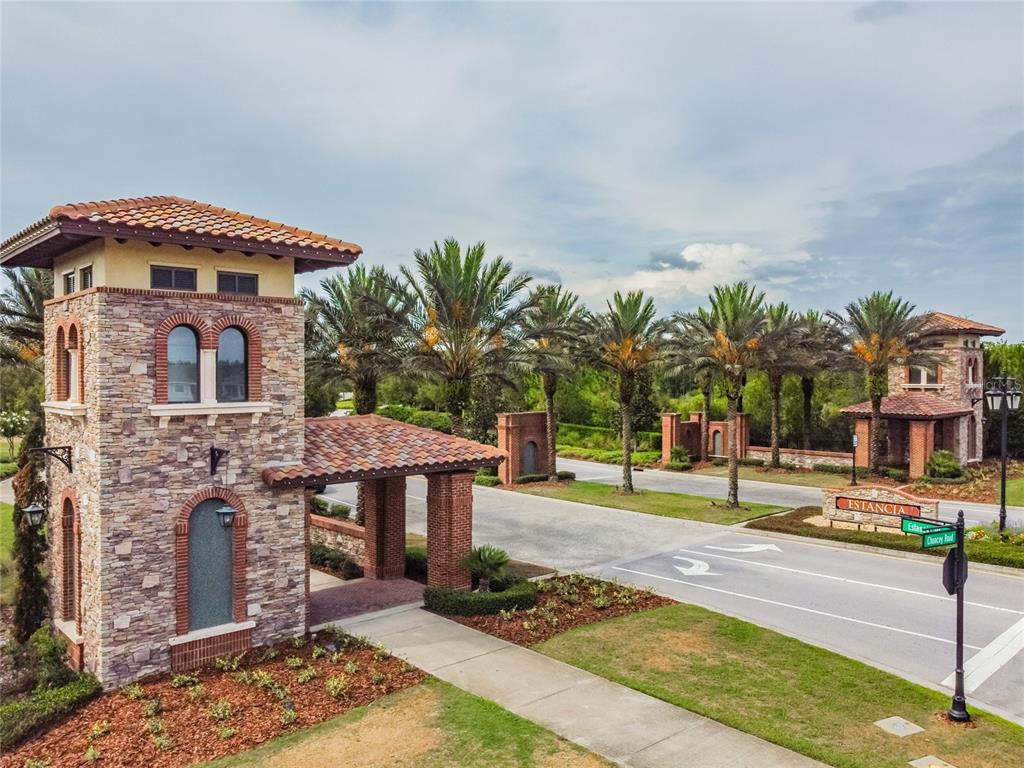 29241 Perilli Place Wesley Chapel, FL 33543 - Photo 3 of 53 a front view of a house with a yard