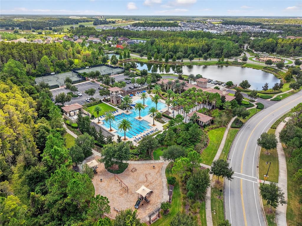 29241 Perilli Place Wesley Chapel, FL 33543 - Photo 47 of 53 an aerial view of residential houses with outdoor space and swimming pool