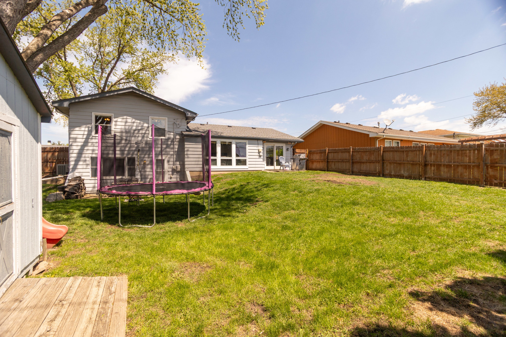 1485 Devonshire Lane Hoffman Estates, IL 60169 - Photo 23 of 27 a view of a house with a yard balcony and sitting area