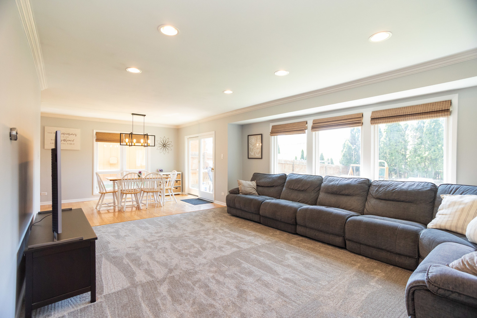 1485 Devonshire Lane Hoffman Estates, IL 60169 - Photo 3 of 27 a living room with furniture and large windows