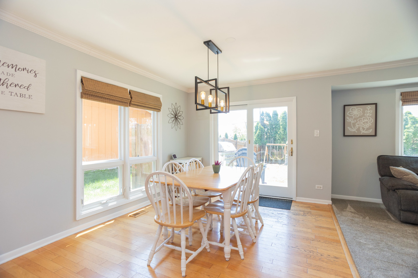 1485 Devonshire Lane Hoffman Estates, IL 60169 - Photo 5 of 27 a dining room with furniture window wooden floor