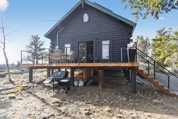 a view of a outdoor space with a table and chairs