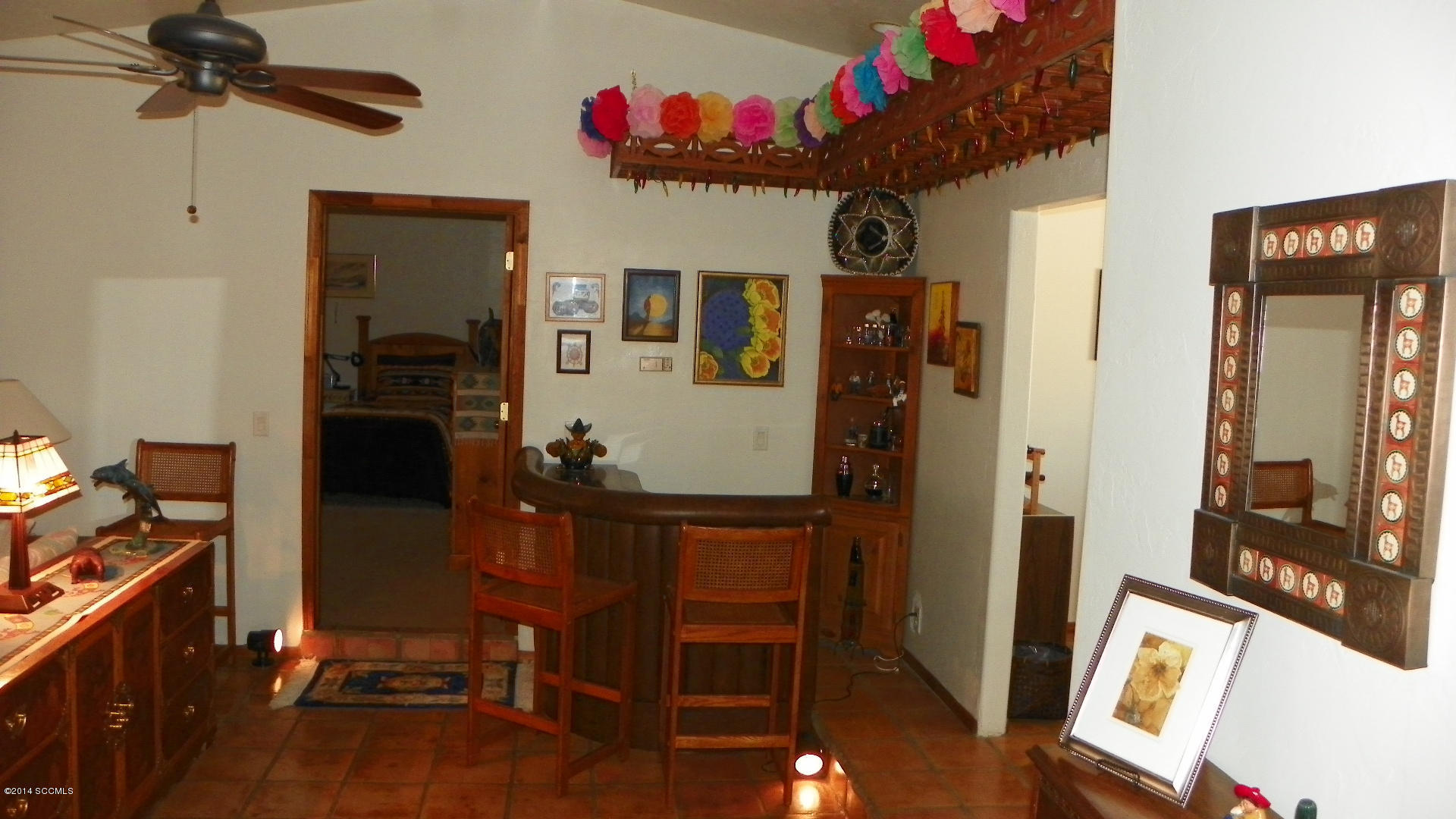 1623 Bufeo Court Rio Rico, AZ 85648 - Photo 10 of 52 a view of a livingroom with furniture window and wooden floor