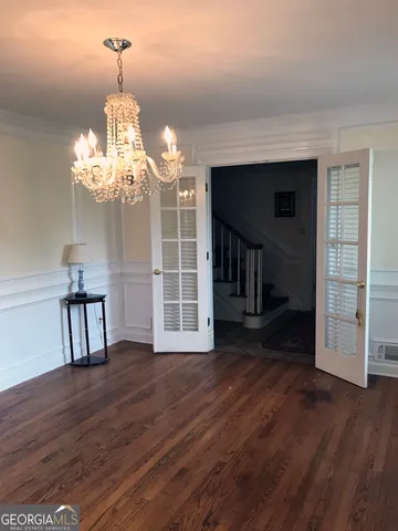 a living room with a fireplace furniture and a fireplace
