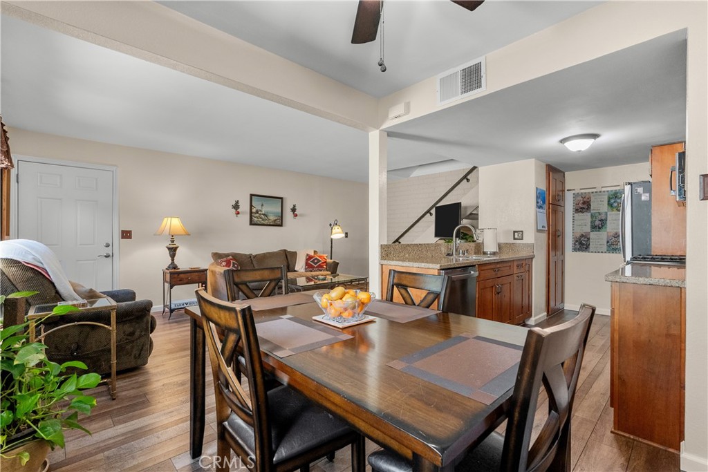 28152 Robin Avenue Saugus, CA 91350 - Photo 13 of 49 a view of a dining room with furniture and wooden floor