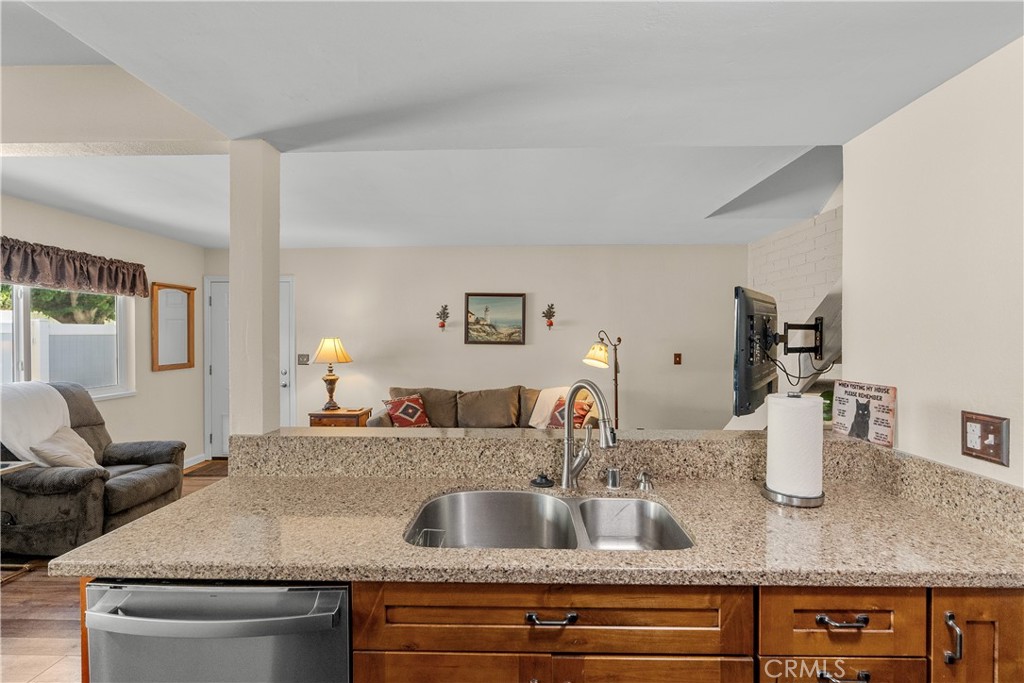 28152 Robin Avenue Saugus, CA 91350 - Photo 18 of 49 a kitchen with sink and mirror