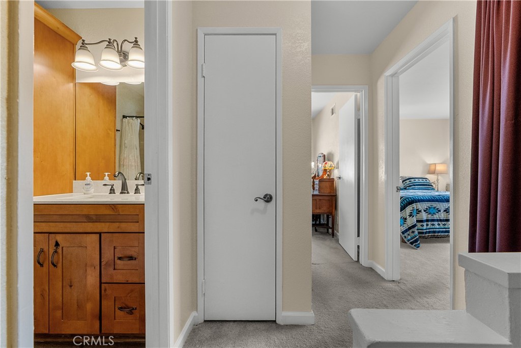 28152 Robin Avenue Saugus, CA 91350 - Photo 23 of 49 a bathroom with a sink and a mirror