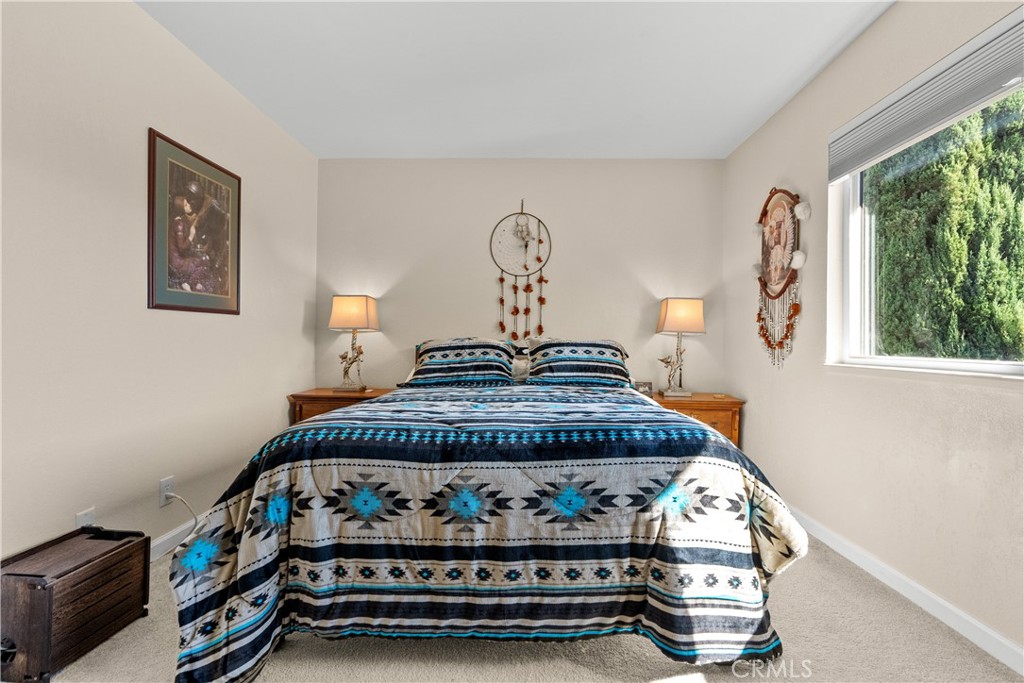 28152 Robin Avenue Saugus, CA 91350 - Photo 31 of 49 a bedroom with furniture and window