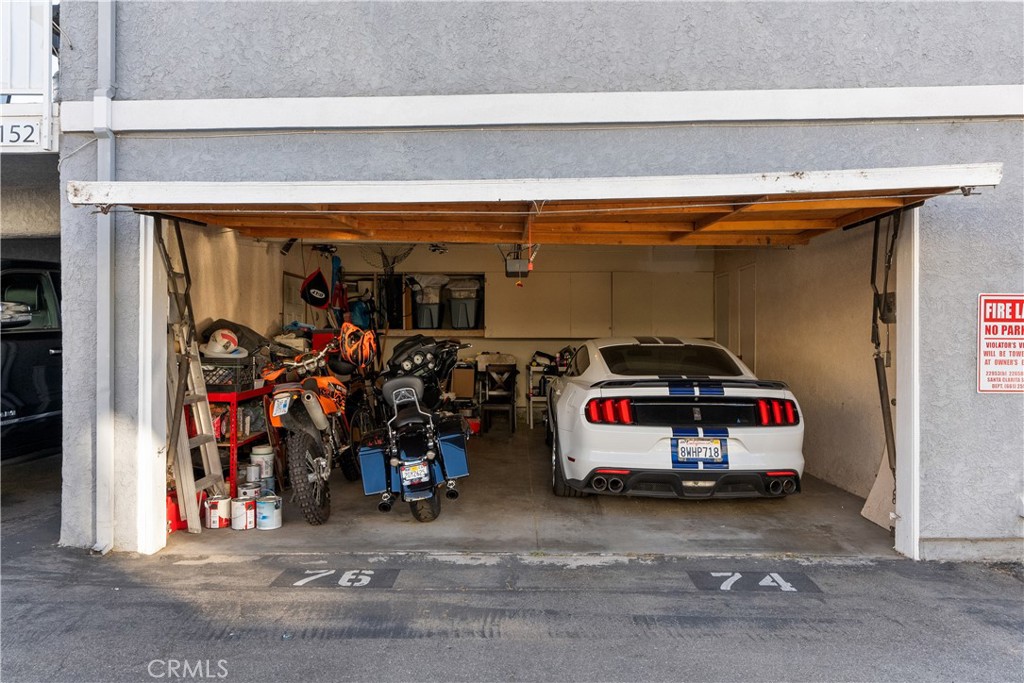 28152 Robin Avenue Saugus, CA 91350 - Photo 34 of 49 a car parked in garage