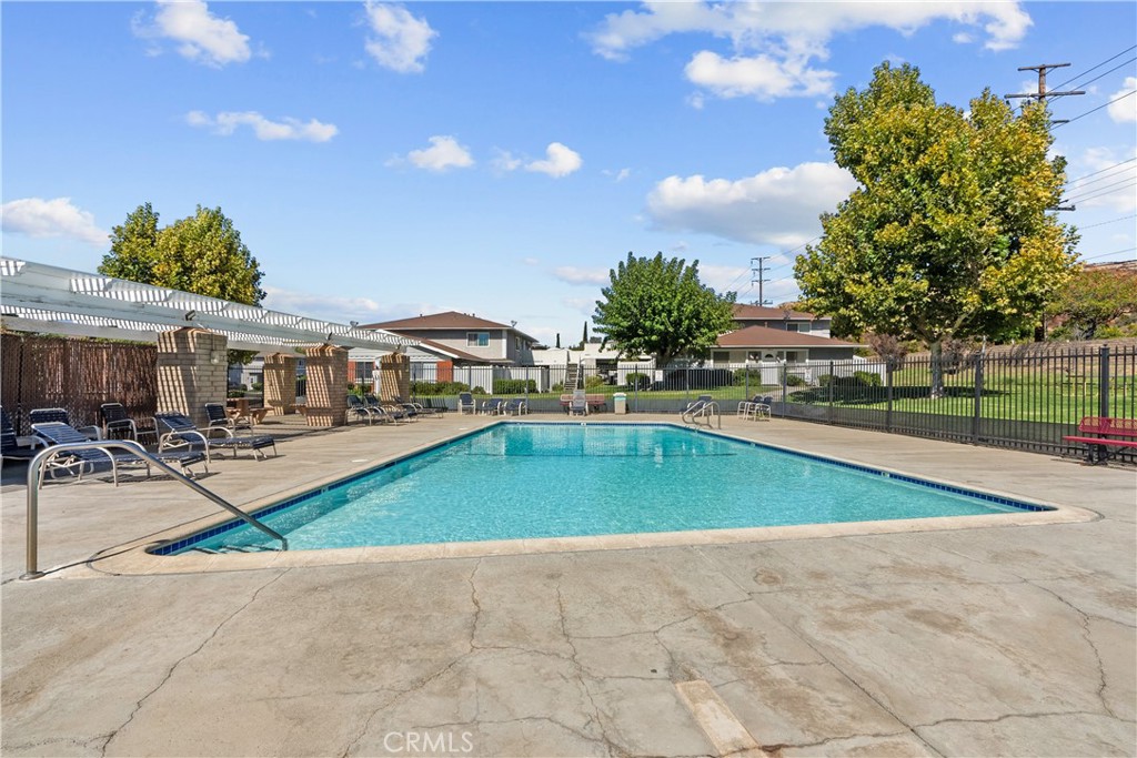 28152 Robin Avenue Saugus, CA 91350 - Photo 45 of 49 a swimming pool with outdoor seating and yard