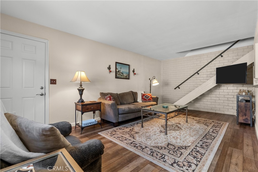 28152 Robin Avenue Saugus, CA 91350 - Photo 9 of 49 a living room with furniture and a flat screen tv
