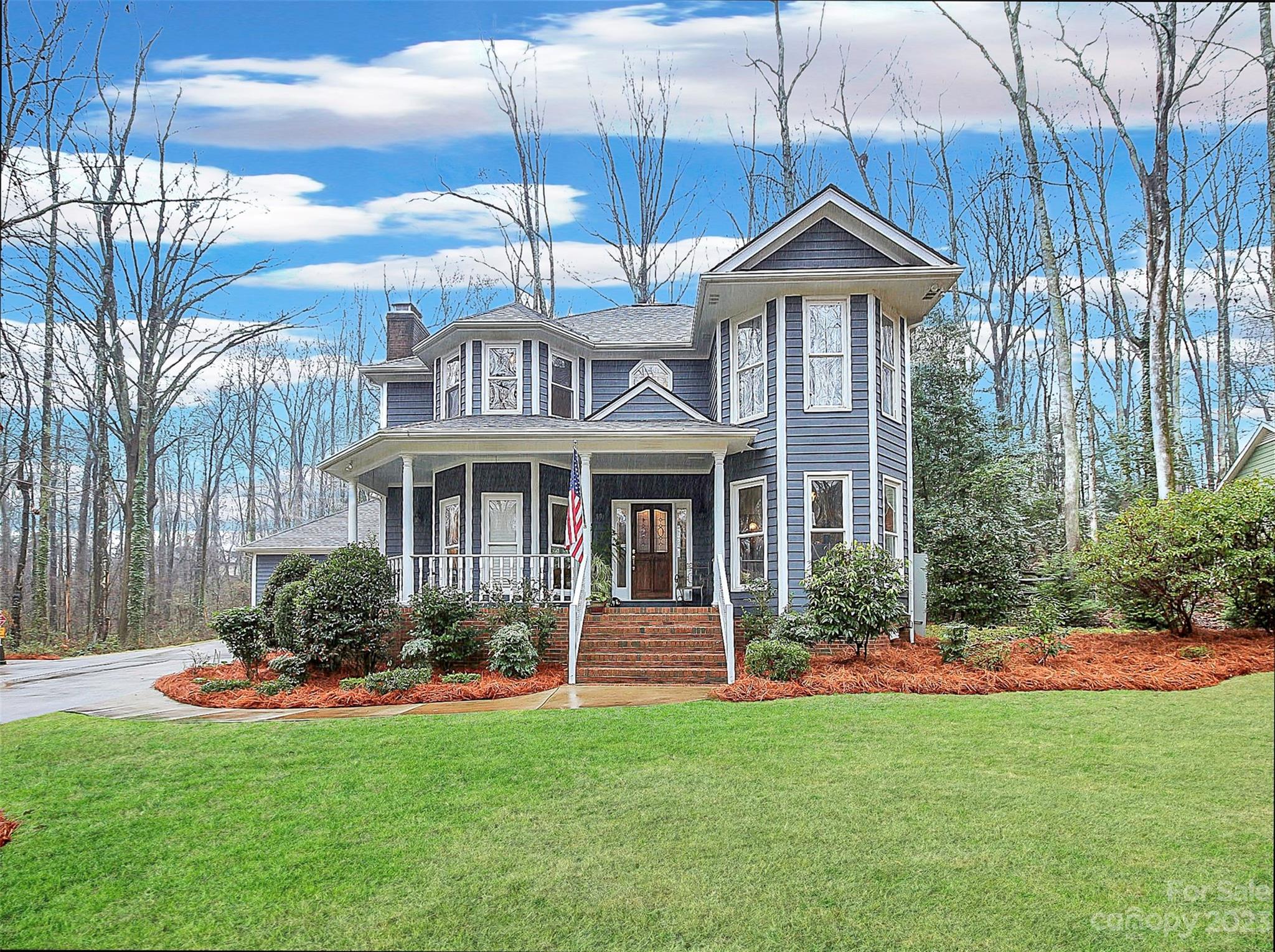 2717 Farmstead Lane Fort Mill, SC 29708 - Photo 1 of 43 a front view of a house with a yard