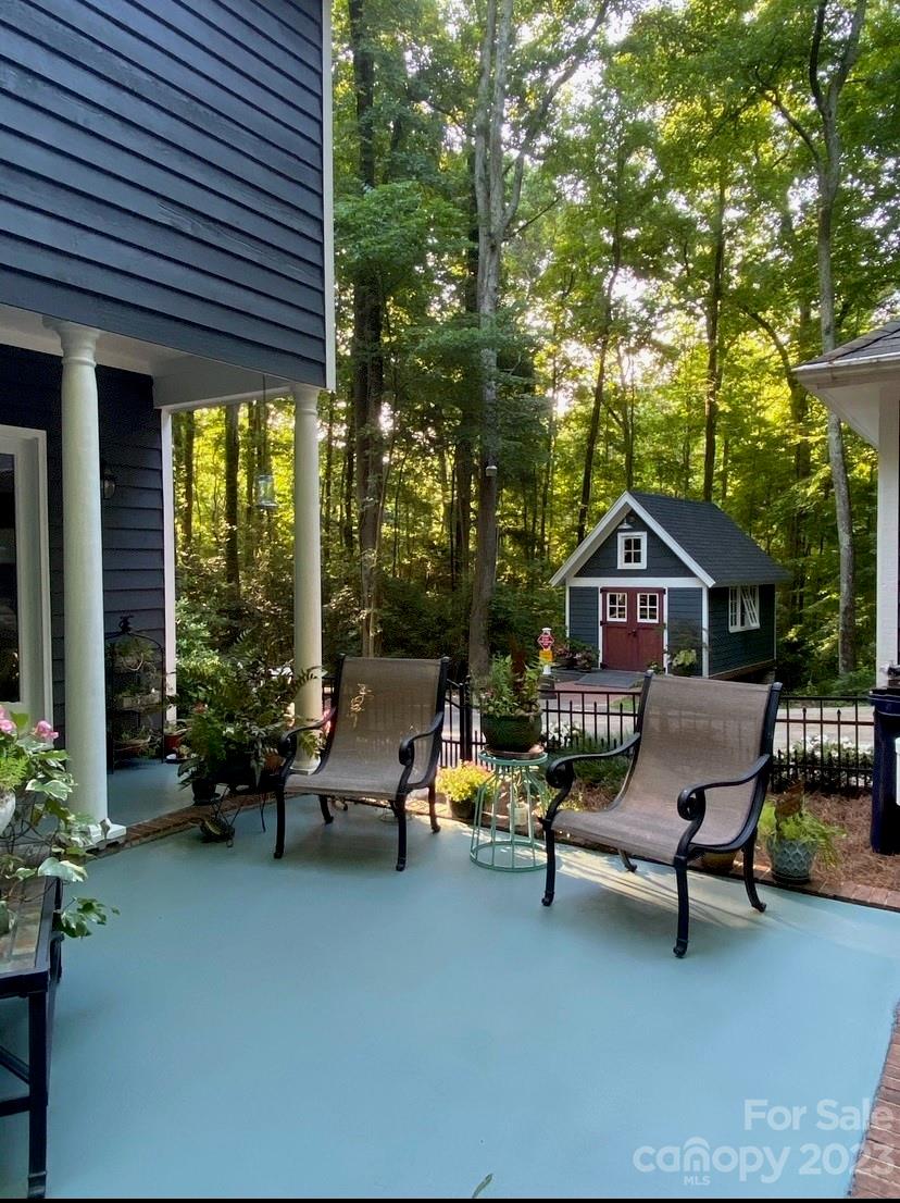 2717 Farmstead Lane Fort Mill, SC 29708 - Photo 42 of 43 a swimming pool with outdoor seating and yard