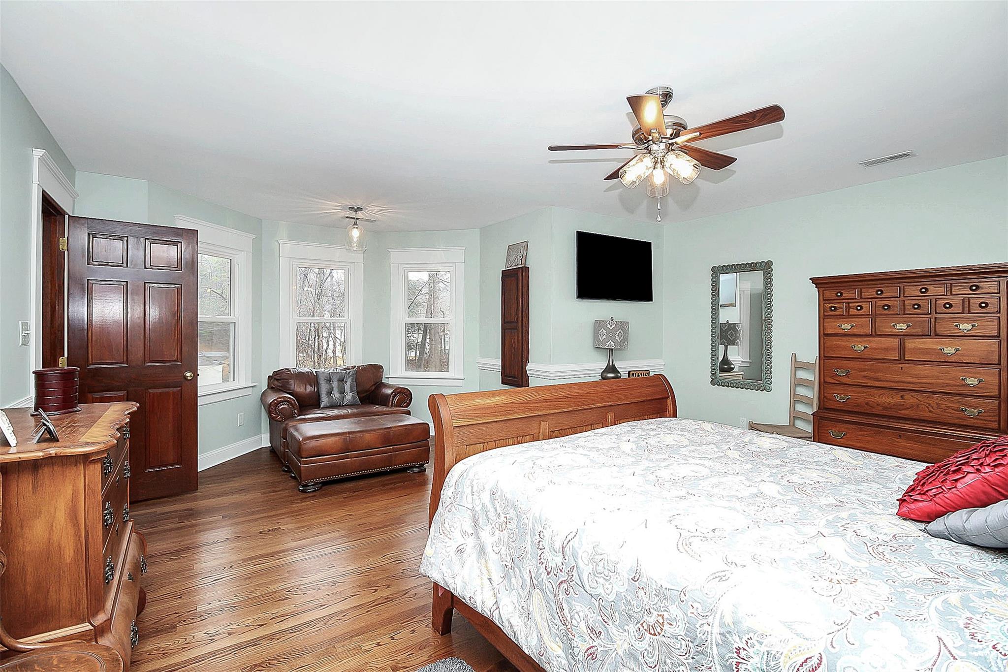 2717 Farmstead Lane Fort Mill, SC 29708 - Photo 5 of 43 a bedroom with a bed and a flat screen tv