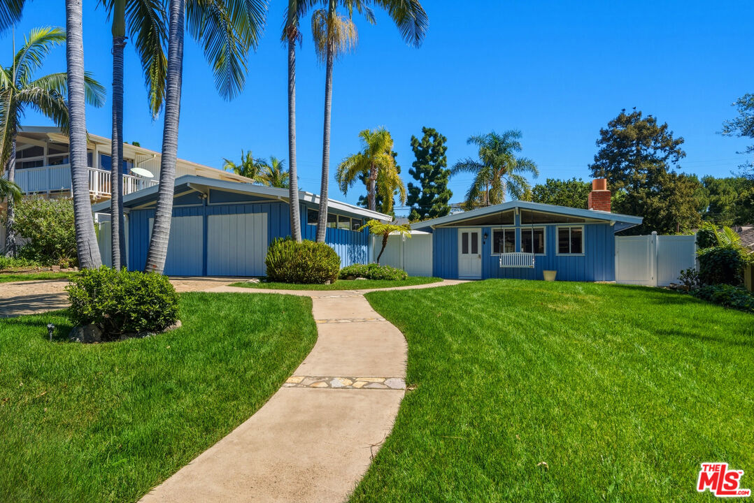 26 Packet Road Rancho Palos Verdes, CA 90275 - Photo 1 of 40 a front view of a house with garden