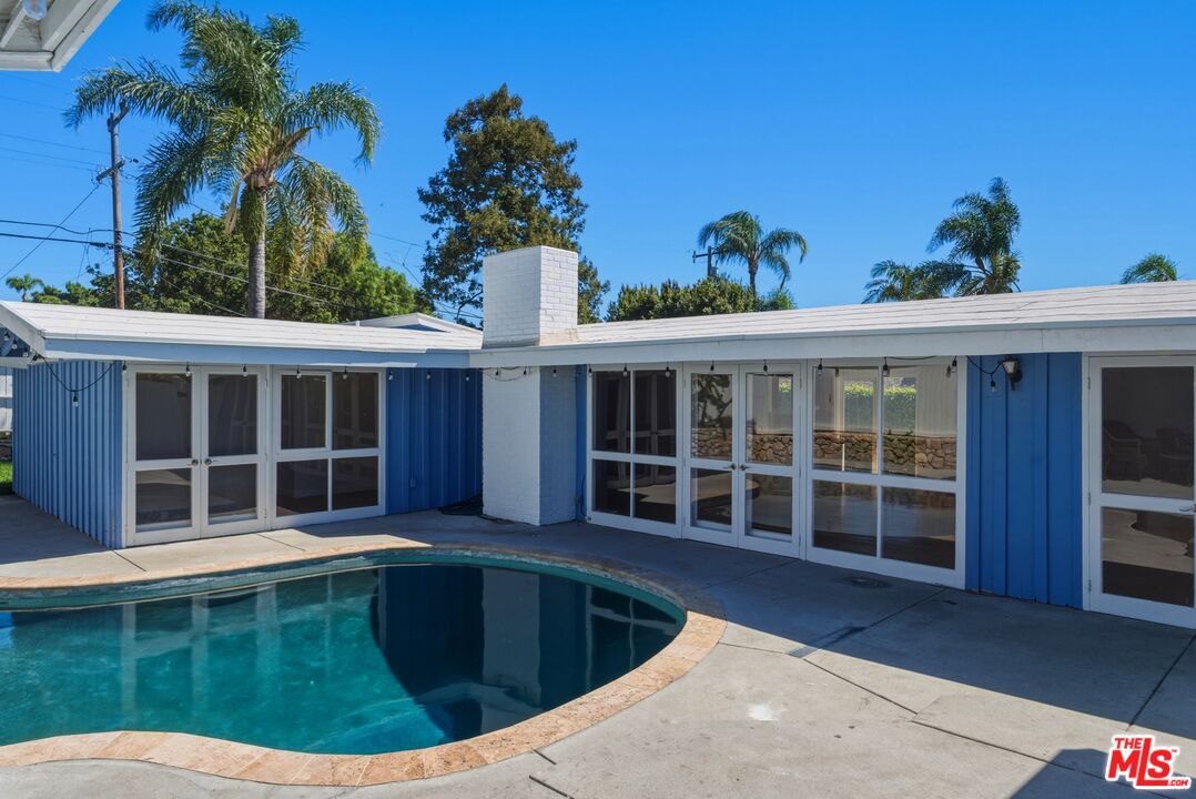 26 Packet Road Rancho Palos Verdes, CA 90275 - Photo 2 of 40 a view of a house with a swimming pool and a yard