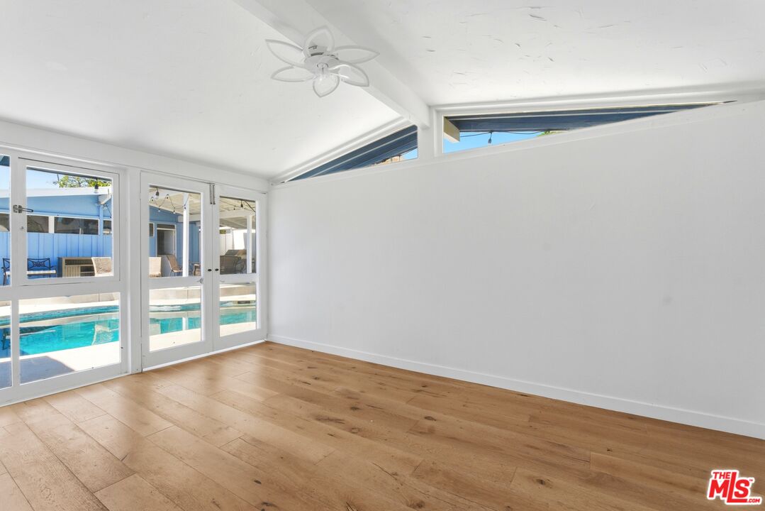 26 Packet Road Rancho Palos Verdes, CA 90275 - Photo 23 of 40 a view of an empty room with wooden floor and a window