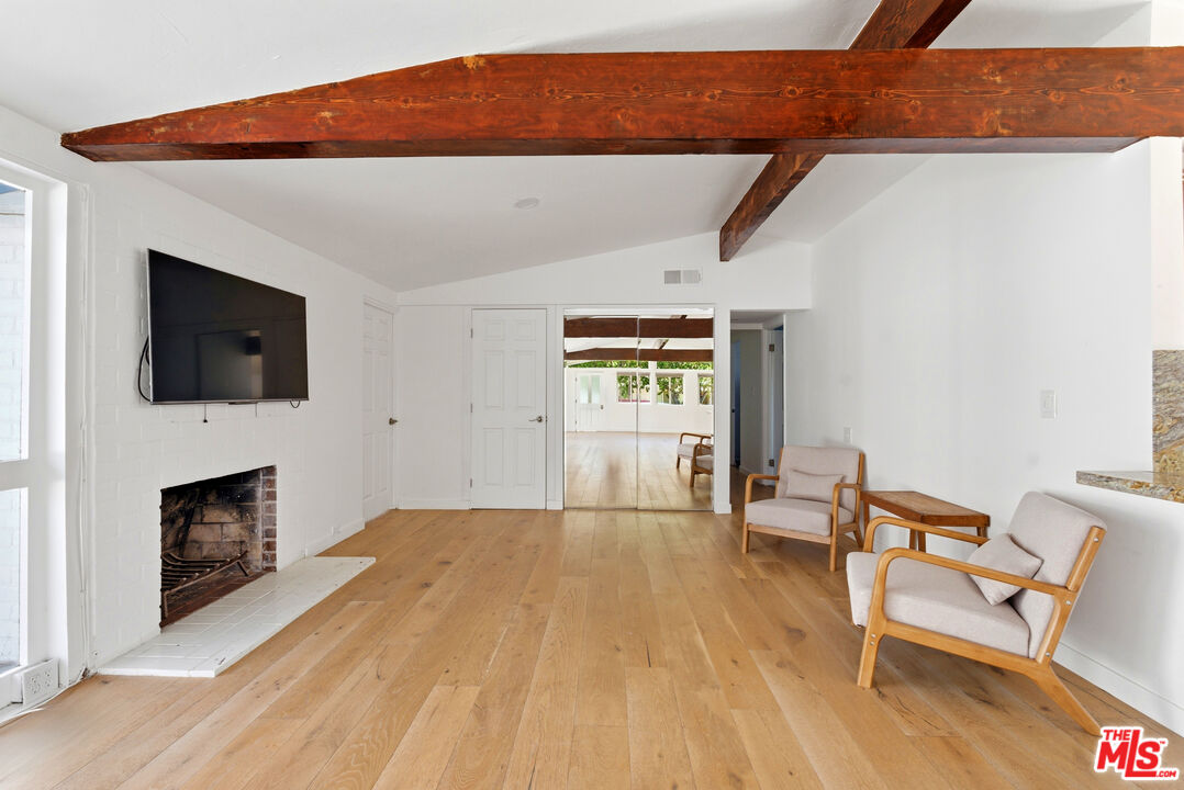 26 Packet Road Rancho Palos Verdes, CA 90275 - Photo 6 of 40 a view of livingroom with furniture and fireplace
