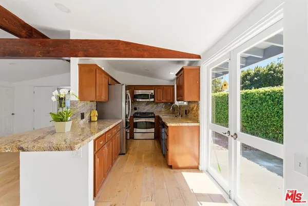 wooden floor in kitchen and dining room with wooden floor