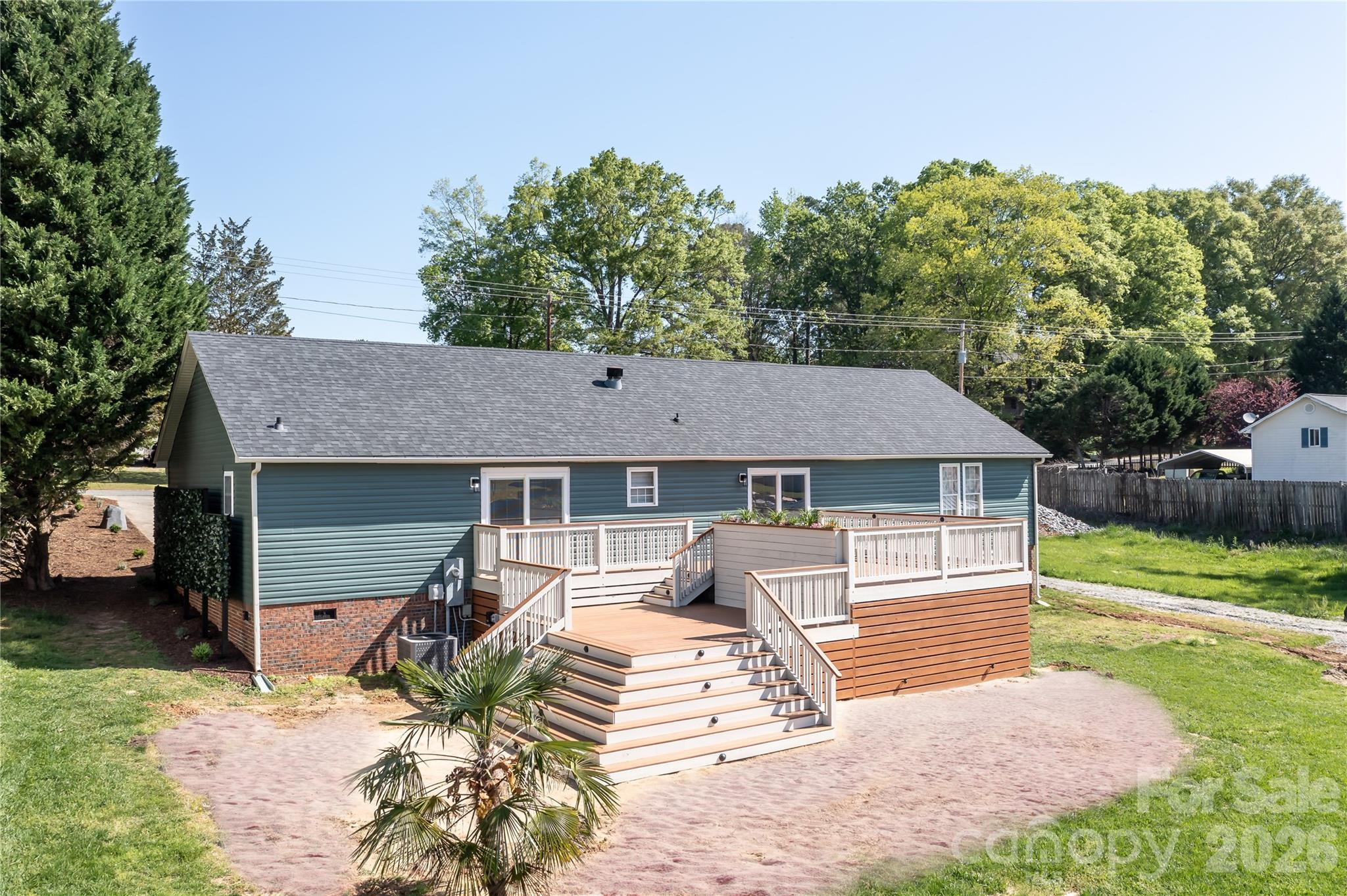 7858 Blackwood Road Denver, NC 28037 - Photo 2 of 11 a front view of a house with a yard