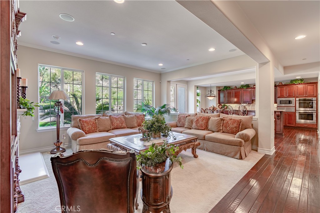 4023 Elderberry Circle Corona, CA 92882 - Photo 16 of 74 a living room with furniture and a large window