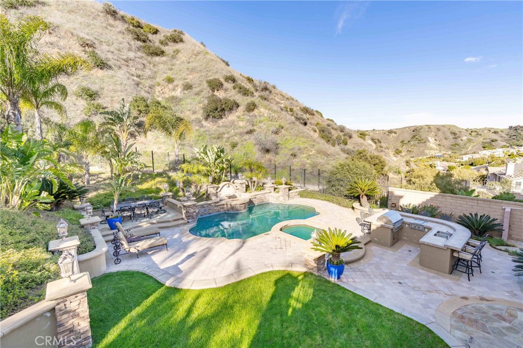 4023 Elderberry Circle Corona, CA 92882 - Photo 28 of 74 a view of a backyard with sitting area