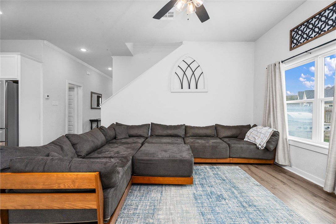 3027 Wolfpack Loop Bryan, TX 77808 - Photo 13 of 39 a living room with furniture and a couch