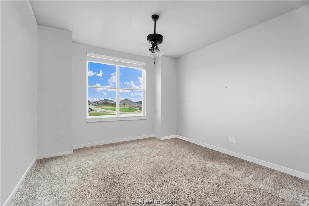 3027 Wolfpack Loop Bryan, TX 77808 - Photo 27 of 39 a view of an empty room with a window