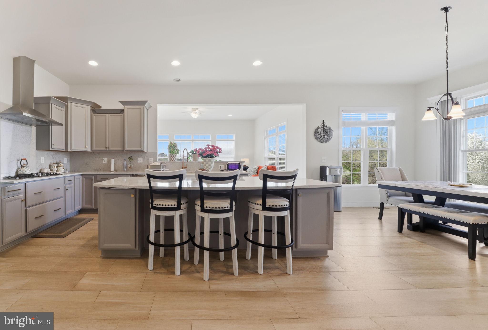 11502 Aden Road Nokesville, VA 20181 - Photo 35 of 106 a large kitchen with a table and chairs