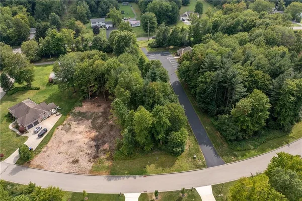 an aerial view of residential house with outdoor space