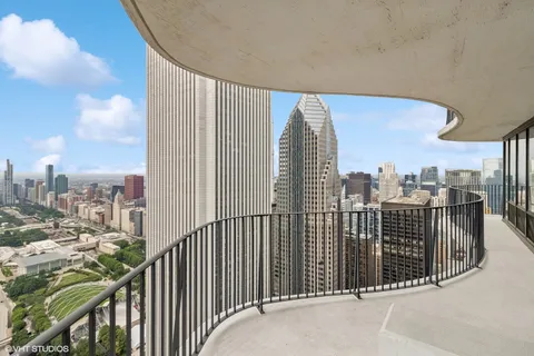 a view of a balcony with city