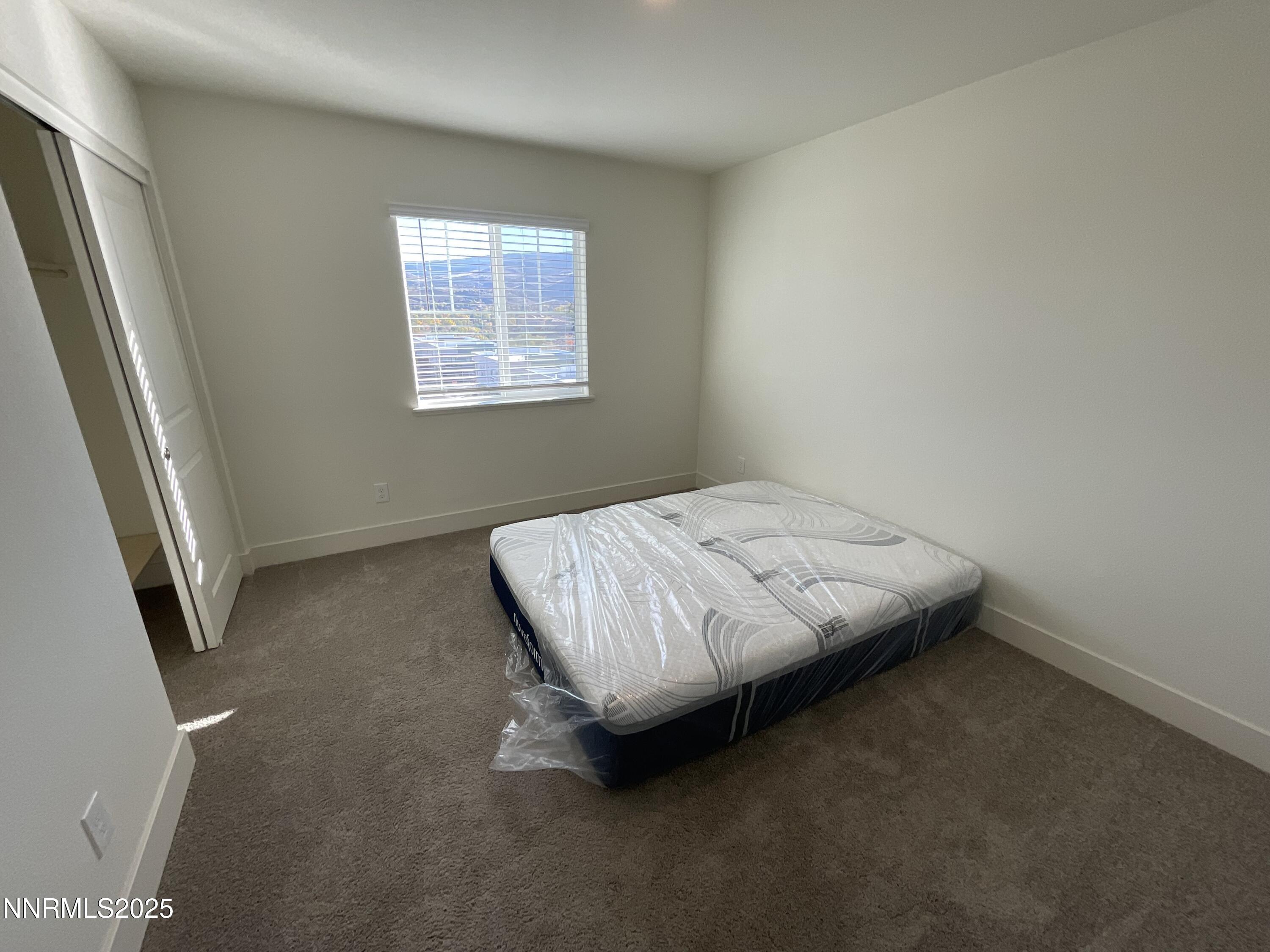 4128 Scenic Drive Reno, NV 89523 - Photo 12 of 20 a bedroom with a bed and a window