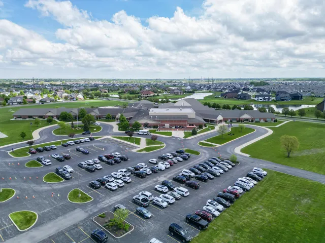 an aerial view of a house with outdoor space