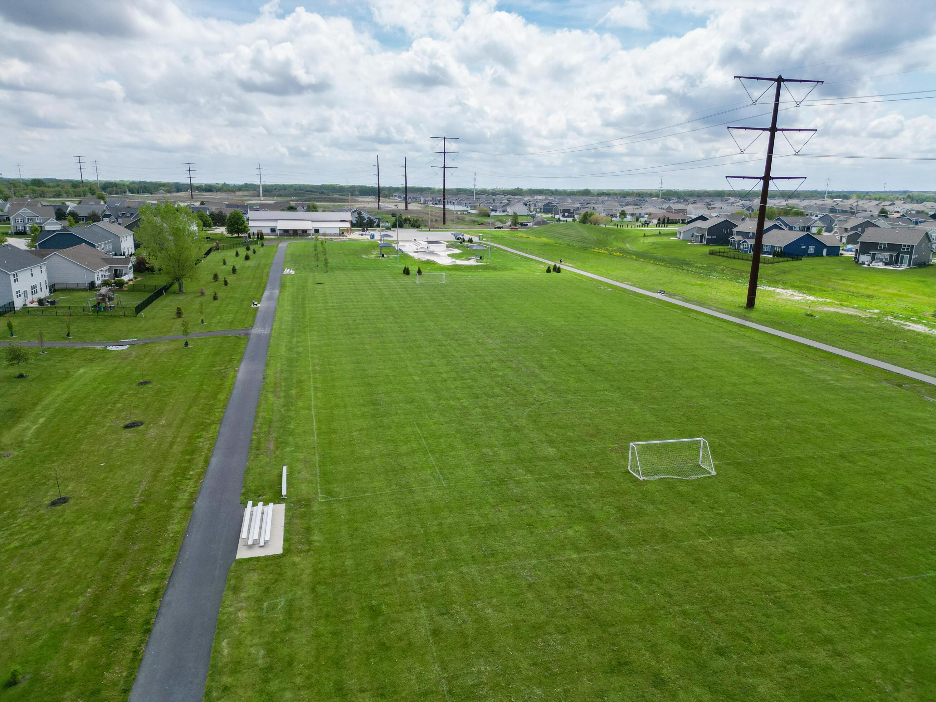 10883 Walnut Drive St. John, IN 46373 - Photo 28 of 30 a view of a golf course with a swimming pool