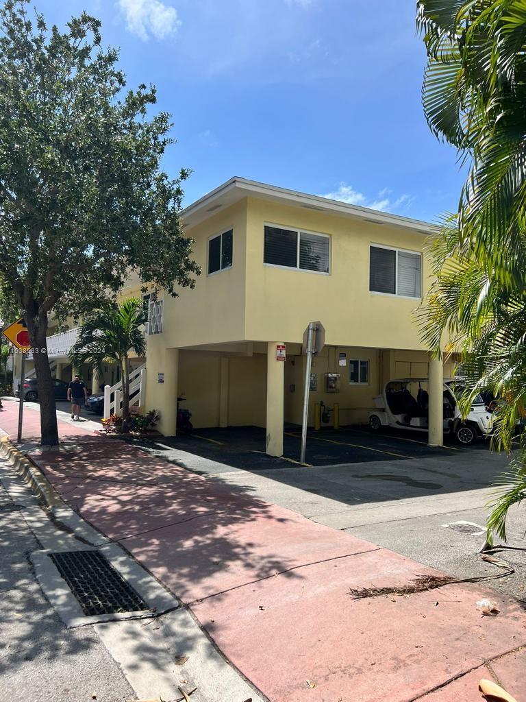 820 3rd Street, Unit 3 Miami Beach, FL 33139 - Photo 3 of 24 a view of a house with a yard